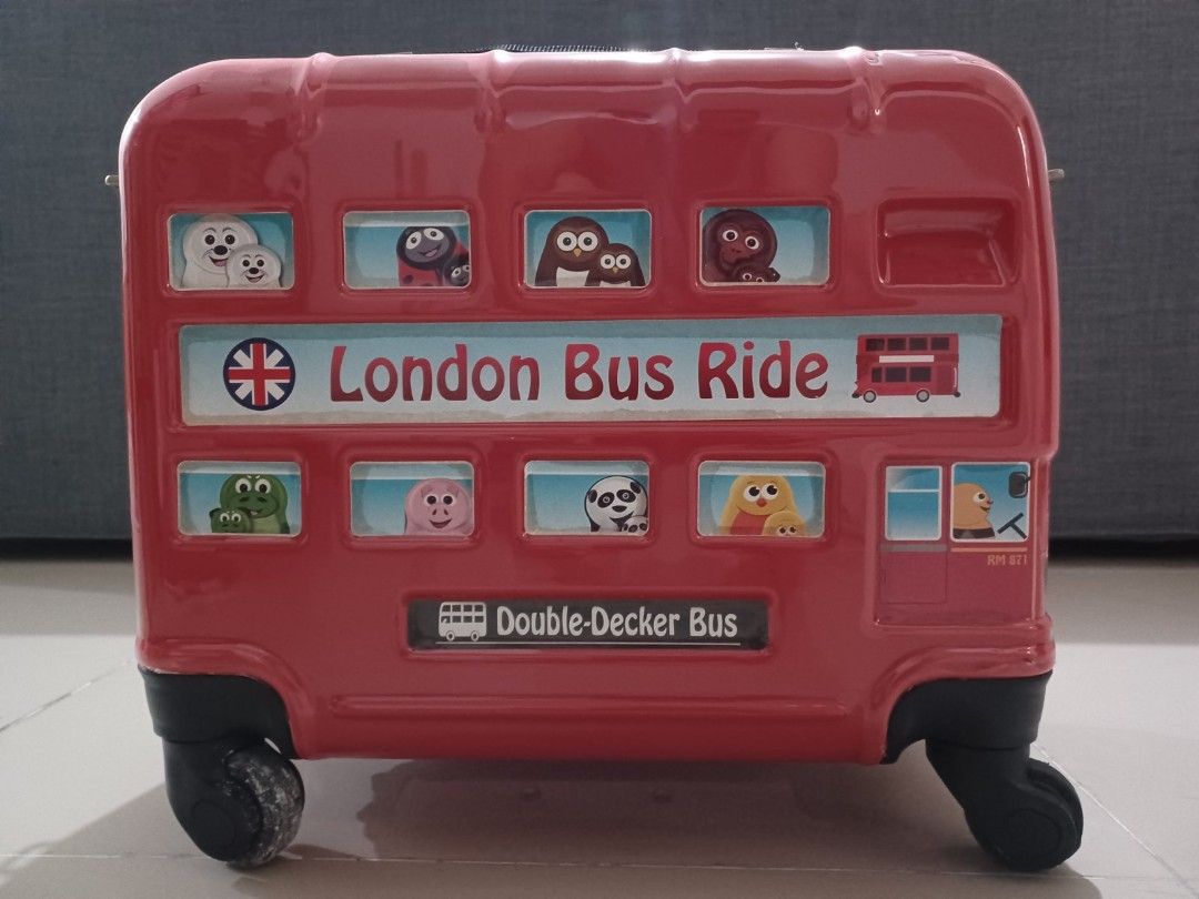 Red London Bus Ride Double-Decker Suitcase (Category: Luggage) located in Quezon City. Submitted by npmrcl (Listing ID 1460538002, Image 1). Description: - Fun red suitcase designed like a London double-decker bus. - Features cute cartoon characters in the windows. - Retractable handle and wheels for easy travel. - Perfect for kids or London fans. - Zips open to reveal storage space with straps..