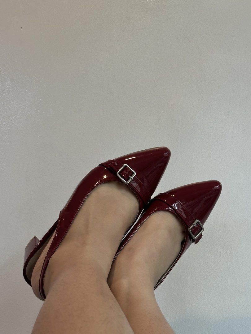 Pointed toe maroon heels with buckle (Category: Heels) located in Quezon City. Submitted by forgirls.co (Listing ID 1460557013, Image 2). Description: - Eye-catching red patent slingback heels - Elegant pointed toe design - Secure and stylish strap with buckle closure - Comfortable and stable block heel - Versatile for dressing up or down - Ideal for walking and all-day wear.