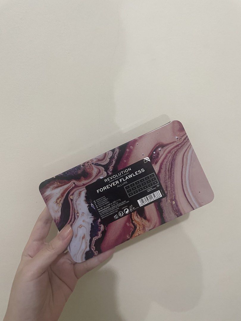 Revolution Forever Flawless Allure Eyeshadow Palette (Category: Makeup) located in Bulacan. Submitted by kkaye_ (Listing ID 1460619068, Image 3). Description: Revolution London eyeshadow palette with 18 matte & shimmer shades. Features a marbled cover and built-in mirror. Perfect for any look! original price is 2k+ rfs: just swatched, too many make ups.
