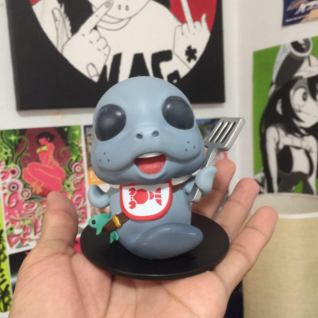 Riot Games Merchandise Figurine - 2015 (Category: Figurines & Statues) located in Manila. Submitted by ikawbasiwagwag8 (Listing ID 1460574332, Image 1). Description: - Adorable collectible figurine from Riot Games. - Features a cute seal character. - Comes with a spatula and a small cannon accessory. - Base has a 2015 copyright marking. - Made in China. - A must-have for any Riot Games enthusiast!.