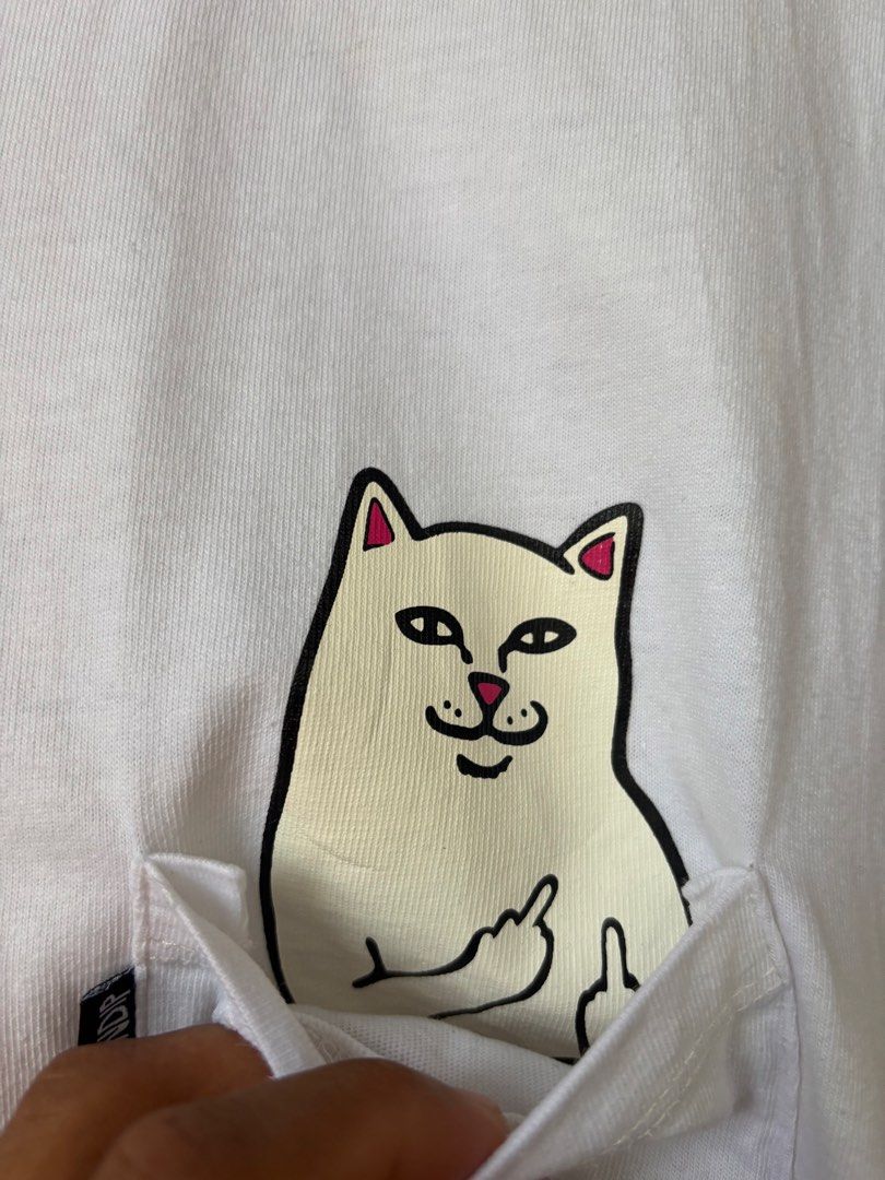 RIPNDIP Lord Nermal Pocket Tee🤍 Medium on tag (Category: Tshirts & Polo Shirts ) located in Maasin. Submitted by chevyferna66833 (Listing ID 1460604758, Image 2). Description: R*PNDIP Lord Nermal Pocket Tee🤍 Medium on tag Length 28 Width 21 Good condition Mine 450.