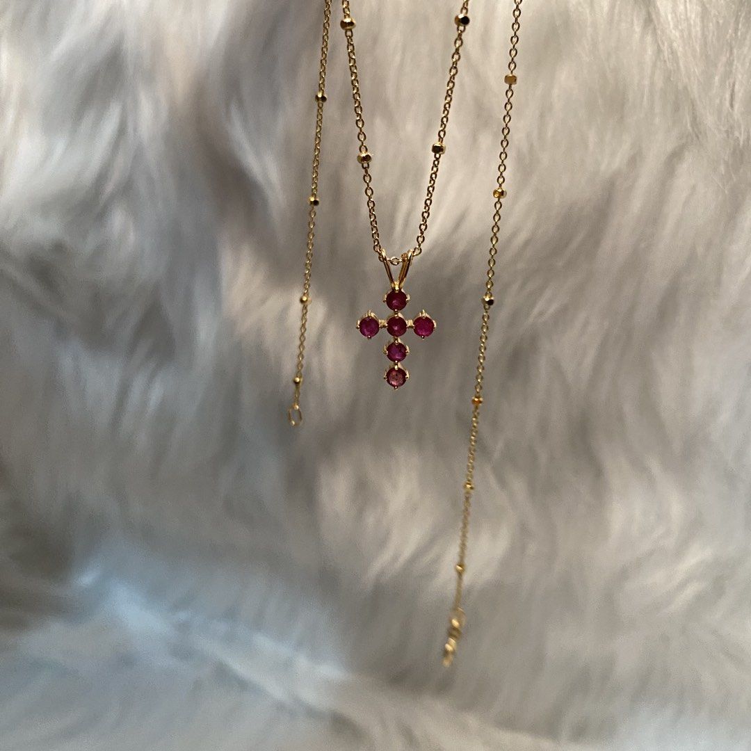 Ruby Cross Pendant in YG (Category: Charms) located in Tiaong. Submitted by sourcedbyhannie (Listing ID 1460578827, Image 2). Description: 18K YG Ruby Cross Pendant HK settings Chain not included.