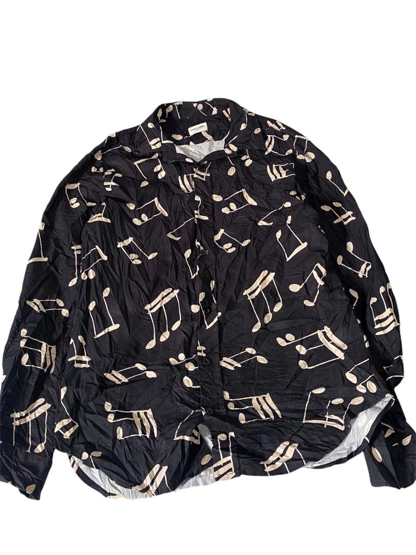 Authentic Saint Laurent Paris Black Music Notes Shirt (Category: Tshirts & Polo Shirts ) located in Cagayan de Oro. Submitted by charlessober (Listing ID 1460553566, Image 2). Description: - Saint Laurent Paris shirt - Black with all-over white music note print - Long sleeves with button cuffs - Button-up front - Relaxed fit - Ideal for music enthusiasts.