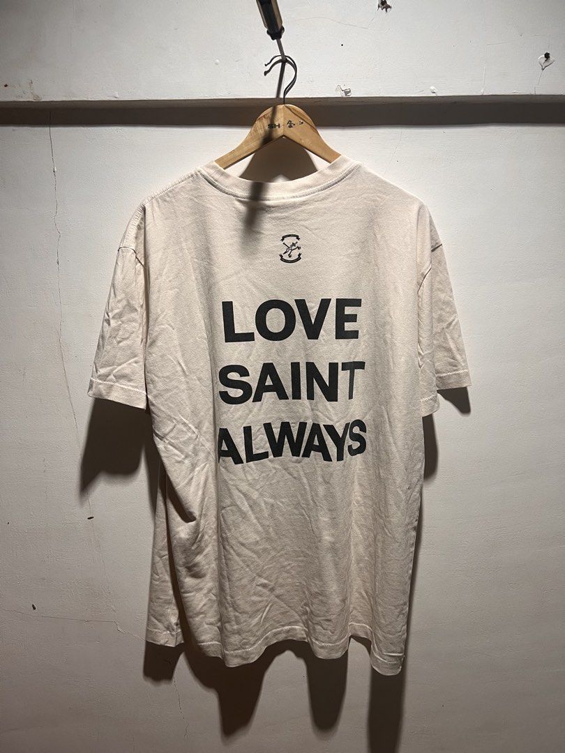 Saint Mxxxxxx Hate Sheep Tee White (Category: Tshirts & Polo Shirts ) located in San Juan, La Union. Submitted by jeggystyle (Listing ID 1460526494, Image 2). Description: - White Saint Mxxxxxx T-shirt - Unique front graphic: "HATE SAINT" with a sheep image - Unique back graphic: "LOVE SAINT ALWAYS" - Perfect for collectors - Versatile for any wardrobe.