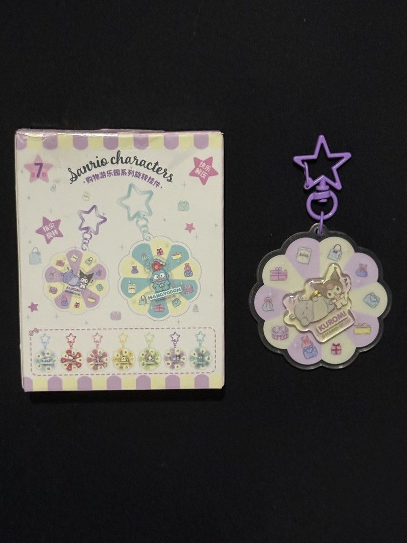 Sanrio Kuromi Spinner Acrylic Charm (Category: Character Goods) located in Mandaluyong City. Submitted by myeonii.e (Listing ID 1460680550, Image 1). Description: Moetch Sanrio Shopping Park Rotating Acrylic Charm! Comes with the box, it’s a bit beat up. Original price ₱199! Feel free to message me if you have any questions or inquiries! I can send more pictures upon request 🤍.