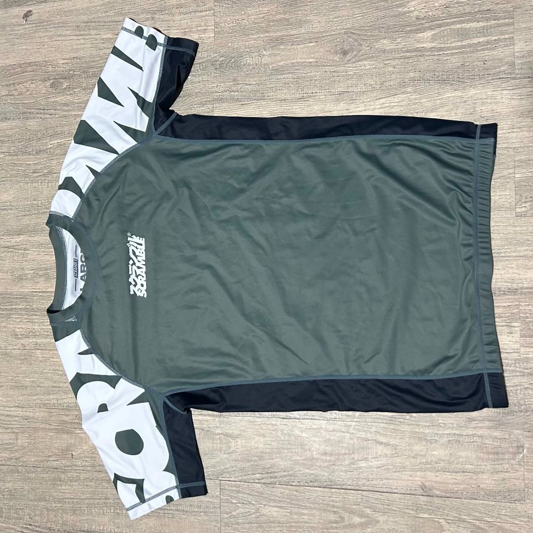 Scramble rash guard (Category: Activewear) located in Paranaque City. Submitted by raphaeldleon (Listing ID 1460530438, Image 1). Description: Very good condition Size - 28" by 19".