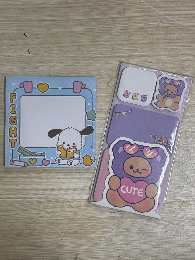 [SET] Cute Sanrio Pompompurin & Teddy Bear Sticky Notes Set (Category: Stationery & School Supplies) located in Naga. Submitted by myroomarchive (Listing ID 1460613290, Image 1). Description: - Pompompurin reading a book sticky notes - Teddy bear in a cute outfit sticky notes - Ideal for journaling and decorating - Perfect for fans of cute stationery - Bundle includes both sets.