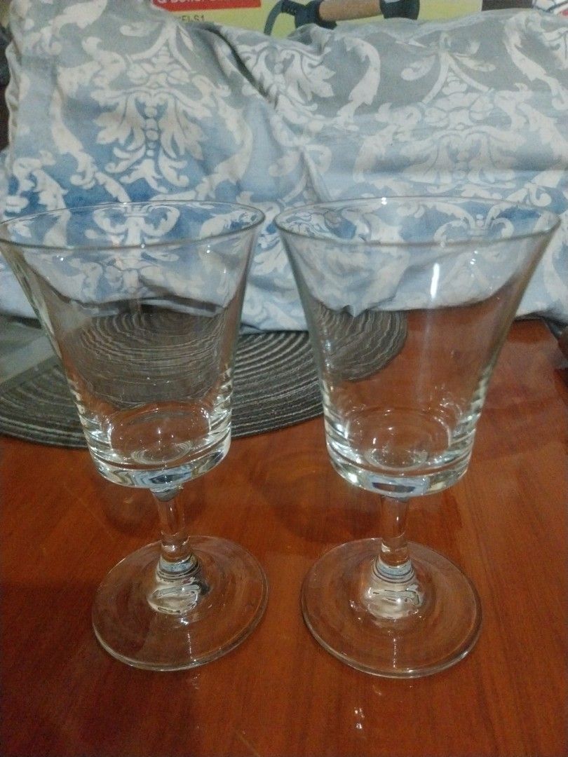 Set of 2 Clear Wine Glasses (Category: Dinnerware & Cutlery) located in Paranaque City. Submitted by riccsmars (Listing ID 1460555596, Image 1). Description: - Set of two clear wine glasses - Classic stemmed design - Versatile for wine or other beverages - Ready for a new home.