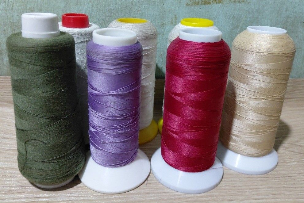 Sewing Threads from Japan (Category: Craft Supplies & Tools) located in Manila. Submitted by penny_blossoms (Listing ID 1460691463, Image 1). Description: Just a bit of a stain on a 3 white threads since it came with other items. Branded threads..