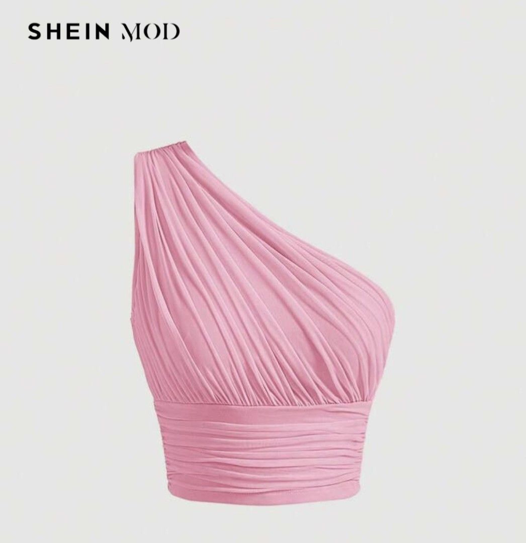 SHEIN MOD Pink Ruched One-Shoulder Crop Top (Category: Blouses) located in Malabon City. Submitted by lpzangie (Listing ID 1460599522, Image 1). Description: - SHEIN MOD pink ruched one-shoulder crop top - Asymmetrical neckline - Stretchy material with all-over ruching - Banded hem - Ideal for nights out or special occasions - Pairs well with high-waisted pants or skirts.