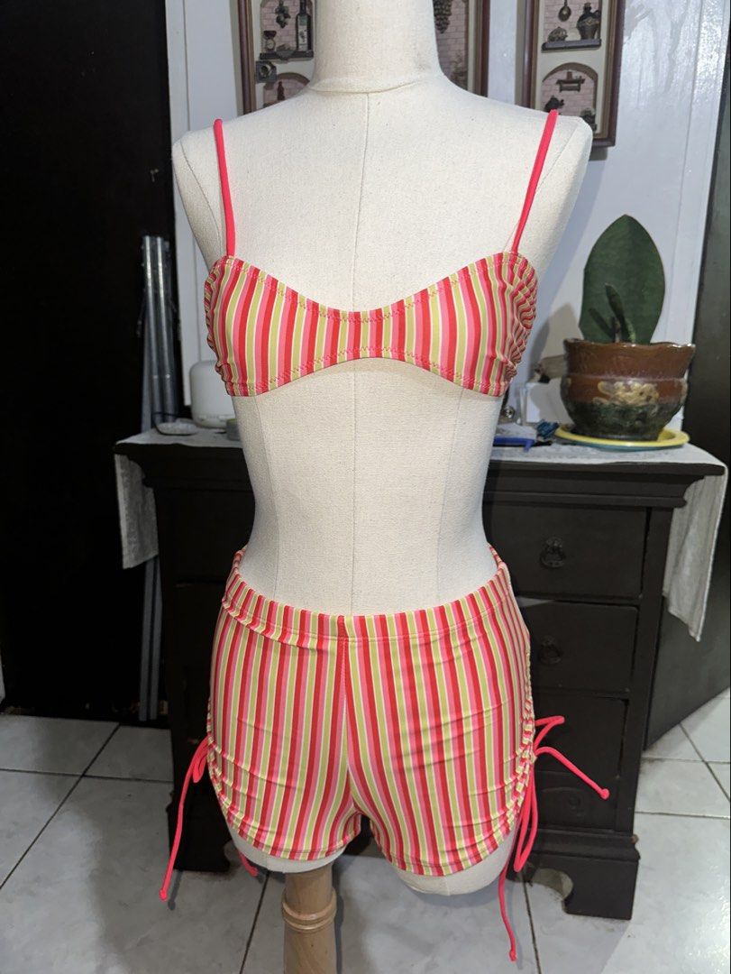 Shein (Noista) - Striped Bikini Set (Category: Bikinis & Swimsuits) located in Quezon City. Submitted by marshyco (Listing ID 1460647602, Image 1). Description: - Adorable striped bikini set - Features a fun pink, yellow, and green stripe pattern - Top has adjustable straps for a comfortable fit - Bottoms feature adjustable tie sides for a customizable look .