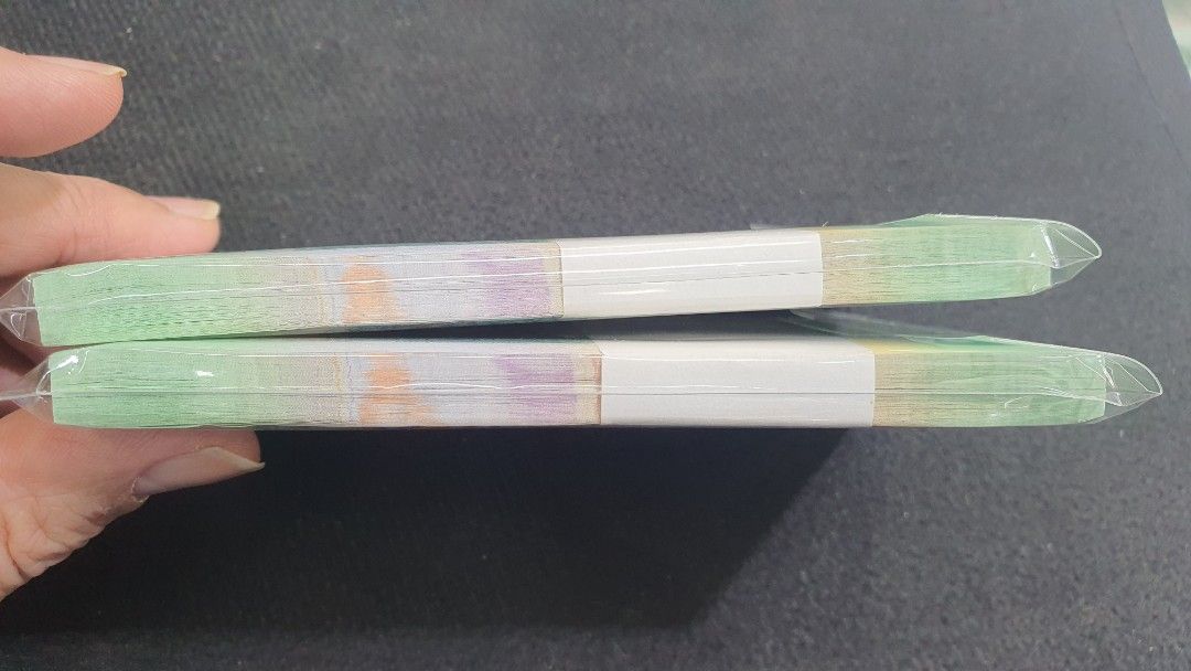 Ship stack (Category: Currency) located in Singapore. Submitted by mrmagic (Listing ID 1460614448, Image 4). Description: Ship series stack GEM UNC very nice conditions with no foxing $2 - 2stacks running - with 200running number $280 x 2stack = $560 GEM UNC very nice conditions with no foxing $5 - 2stacks running - with 200running number (number have Radar 216216 , 216162 ) $850 x 2stack = $1700 $10 - nice stack , but only 1%light foxing behind.