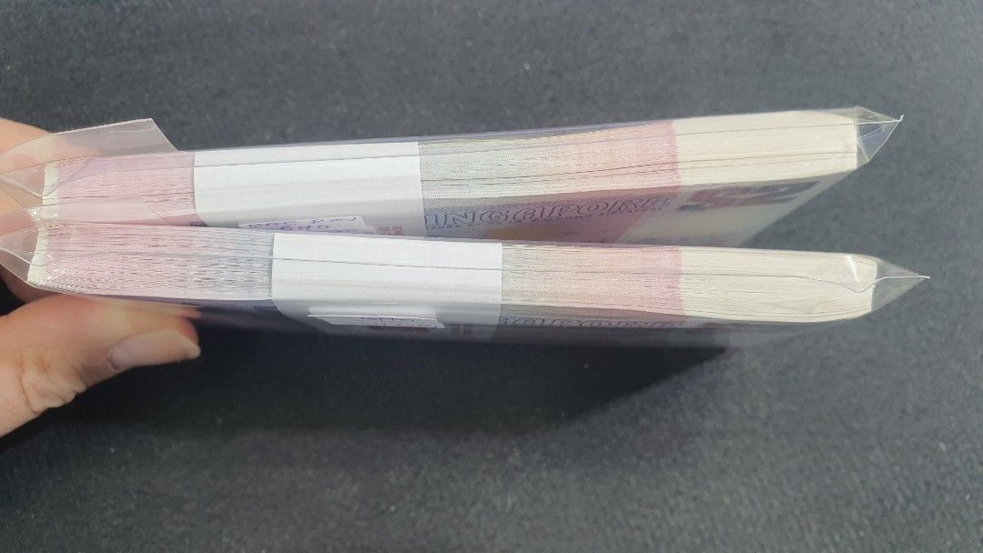 Ship stack (Category: Currency) located in Singapore. Submitted by mrmagic (Listing ID 1460614448, Image 7). Description: Ship series stack GEM UNC very nice conditions with no foxing $2 - 2stacks running - with 200running number $280 x 2stack = $560 GEM UNC very nice conditions with no foxing $5 - 2stacks running - with 200running number (number have Radar 216216 , 216162 ) $850 x 2stack = $1700 $10 - nice stack , but only 1%light foxing behind.