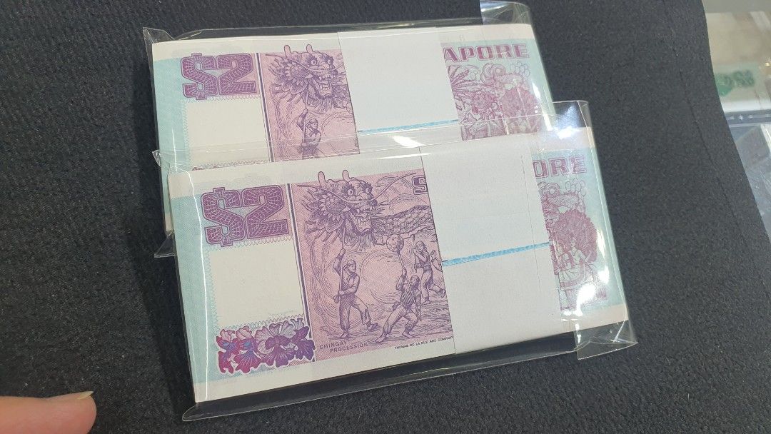 Ship stack (Category: Currency) located in Singapore. Submitted by mrmagic (Listing ID 1460614448, Image 8). Description: Ship series stack GEM UNC very nice conditions with no foxing $2 - 2stacks running - with 200running number $280 x 2stack = $560 GEM UNC very nice conditions with no foxing $5 - 2stacks running - with 200running number (number have Radar 216216 , 216162 ) $850 x 2stack = $1700 $10 - nice stack , but only 1%light foxing behind.