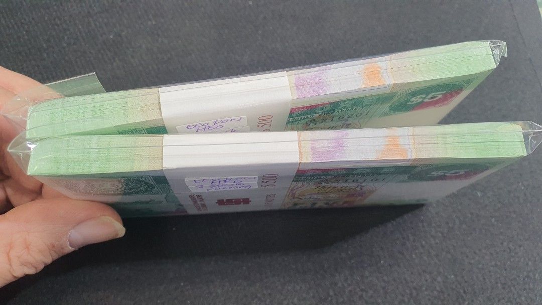 Ship stack (Category: Currency) located in Singapore. Submitted by mrmagic (Listing ID 1460614448, Image 2). Description: Ship series stack GEM UNC very nice conditions with no foxing $2 - 2stacks running - with 200running number $280 x 2stack = $560 GEM UNC very nice conditions with no foxing $5 - 2stacks running - with 200running number (number have Radar 216216 , 216162 ) $850 x 2stack = $1700 $10 - nice stack , but only 1%light foxing behind.