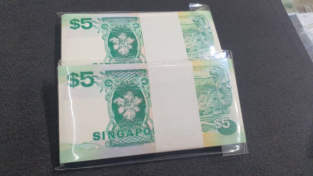 Ship stack (Category: Currency) located in Singapore. Submitted by mrmagic (Listing ID 1460614448, Image 5). Description: Ship series stack GEM UNC very nice conditions with no foxing $2 - 2stacks running - with 200running number $280 x 2stack = $560 GEM UNC very nice conditions with no foxing $5 - 2stacks running - with 200running number (number have Radar 216216 , 216162 ) $850 x 2stack = $1700 $10 - nice stack , but only 1%light foxing behind.