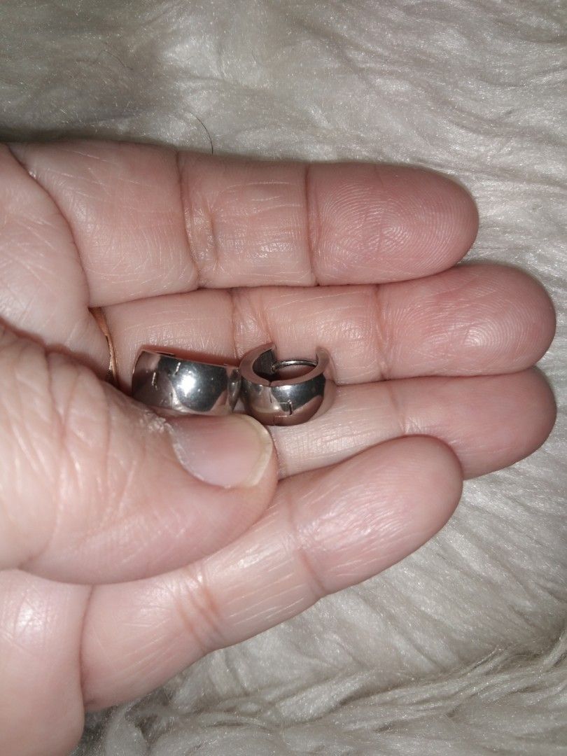 Silver Hoop Earrings thick (Category: Earrings) located in Quezon City. Submitted by eidorableshop (Listing ID 1460565481, Image 2). Description: - Small silver hoop earrings - Simple and classic design - Huggie style - Ideal for everyday wear - Easy to put on and take off.
