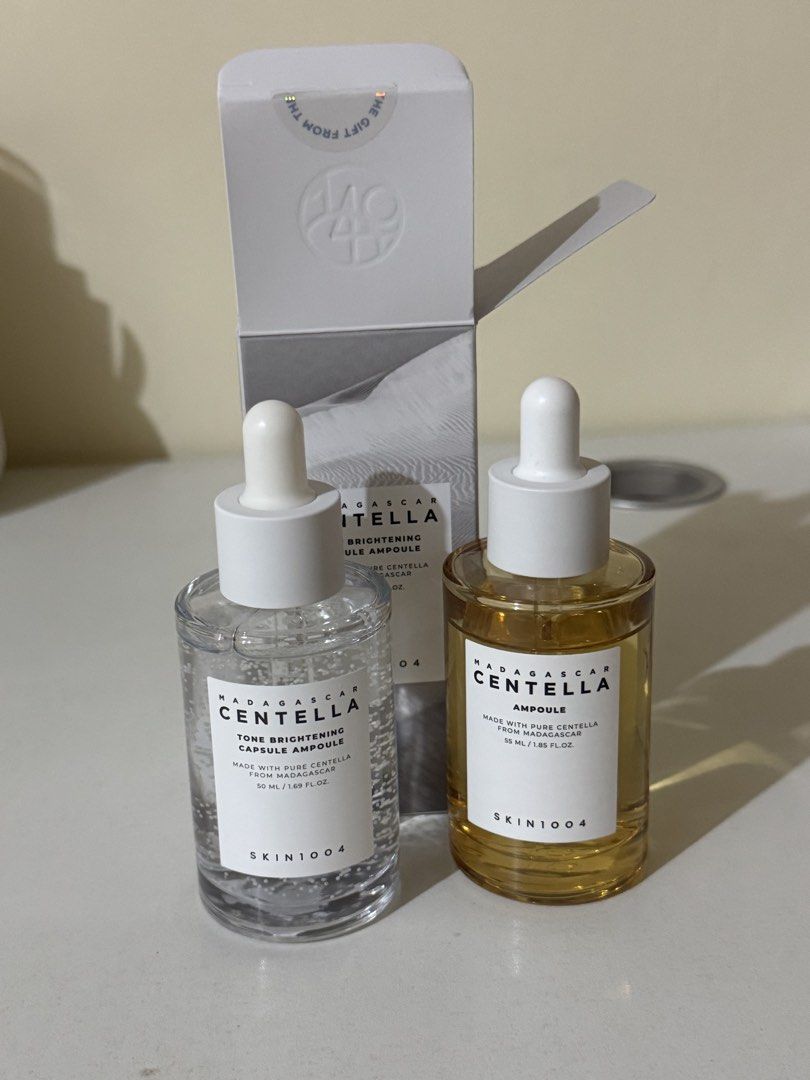 SKIN1004 Madagascar Centella Ampoule Set 50ml (Category: Face Care) located in Imus. Submitted by elyzcartz (Listing ID 1460599806, Image 1). Description: - Set: SKIN1004 Madagascar Centella Tone Brightening Capsule Ampoule (50ml) and SKIN1004 Madagascar Centella Ampoule (50ml). - white serum is sealed and unused, the yellow one was used only for a week. - had to stop since my derma prescribed me acne meds - payment: maribank & bpi - delivery: j&