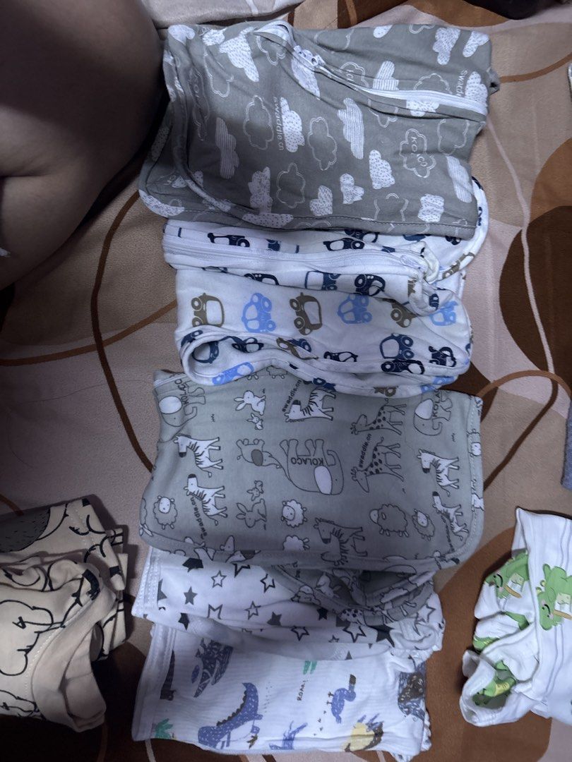 Sleep Sacks and Swaddle (Category: Babies & Kids Fashion) located in Quezon City. Submitted by alexiszowie (Listing ID 1460577745, Image 1). Description: 2 Swaddles 3 sleep sacks Take all.