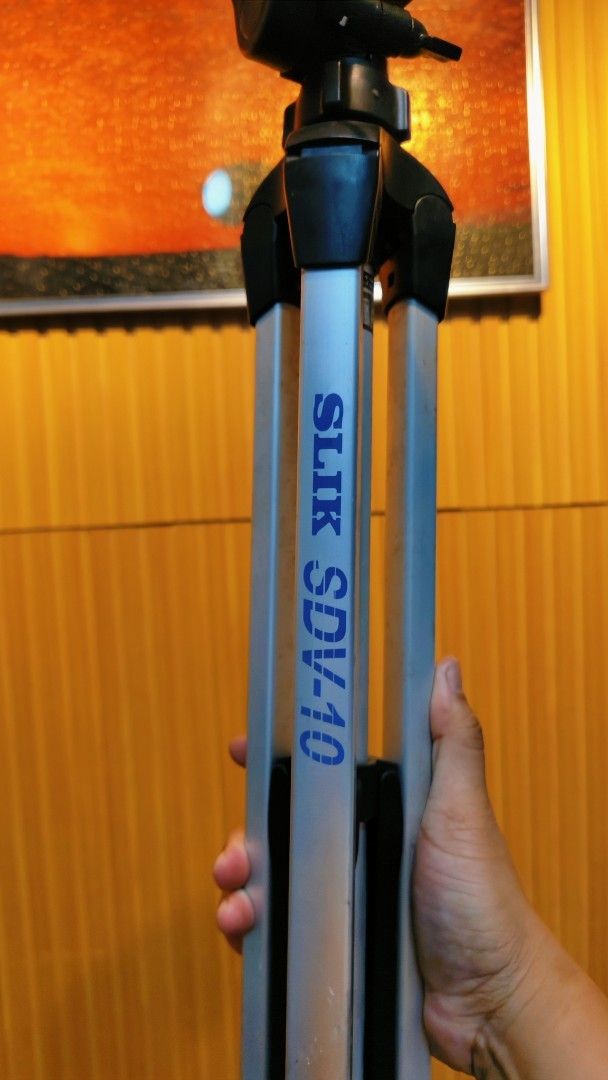 SLIK SDV-10 Tripod (Category: Tripods & Monopods) located in Bulacan. Submitted by babz30261 (Listing ID 1460695507, Image 3). Description: - Sturdy SLIK SDV-10 tripod - Ideal for cameras - Adjustable legs for versatile positioning - Folds down for easy portability 59 inches - Perfect for photography and videography - In good working condition JAPAN QUALITY ALUMINUM .