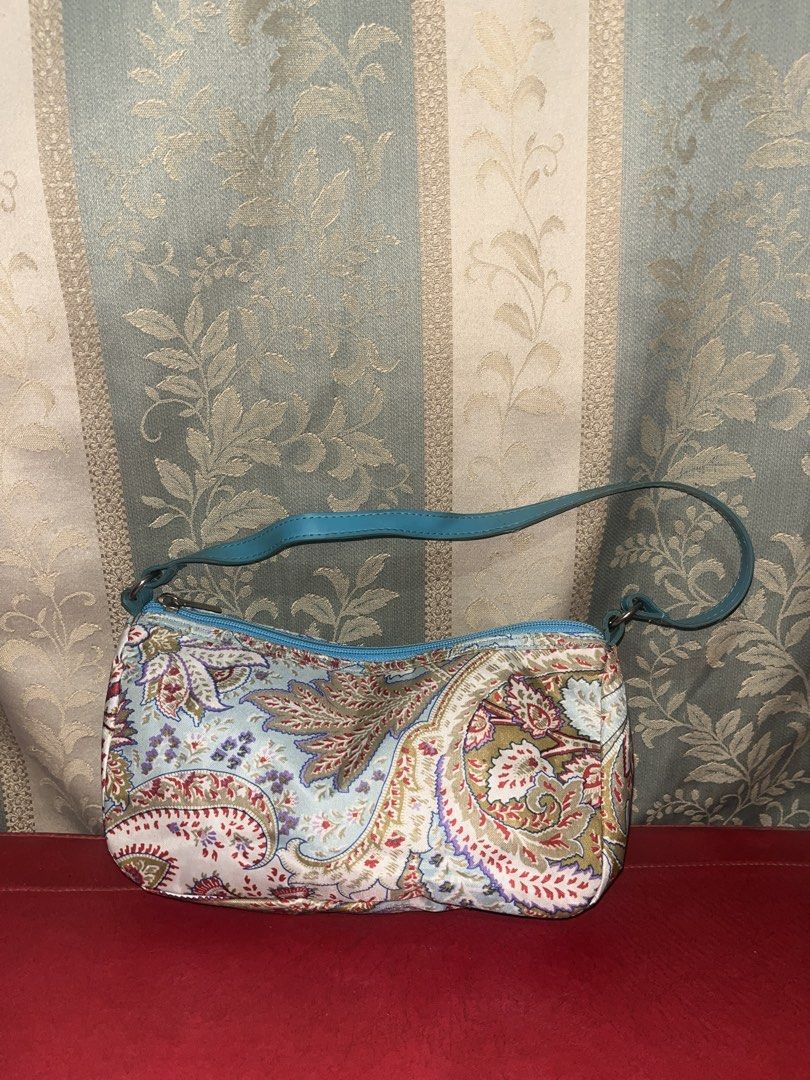 Small Print shoulder bag (Category: Shoulder Bags) located in Davao. Submitted by janna_soleil (Listing ID 1460620701, Image 1). Description: small shoulder bag with a blue, red, and green floral paisley print and a blue strap..