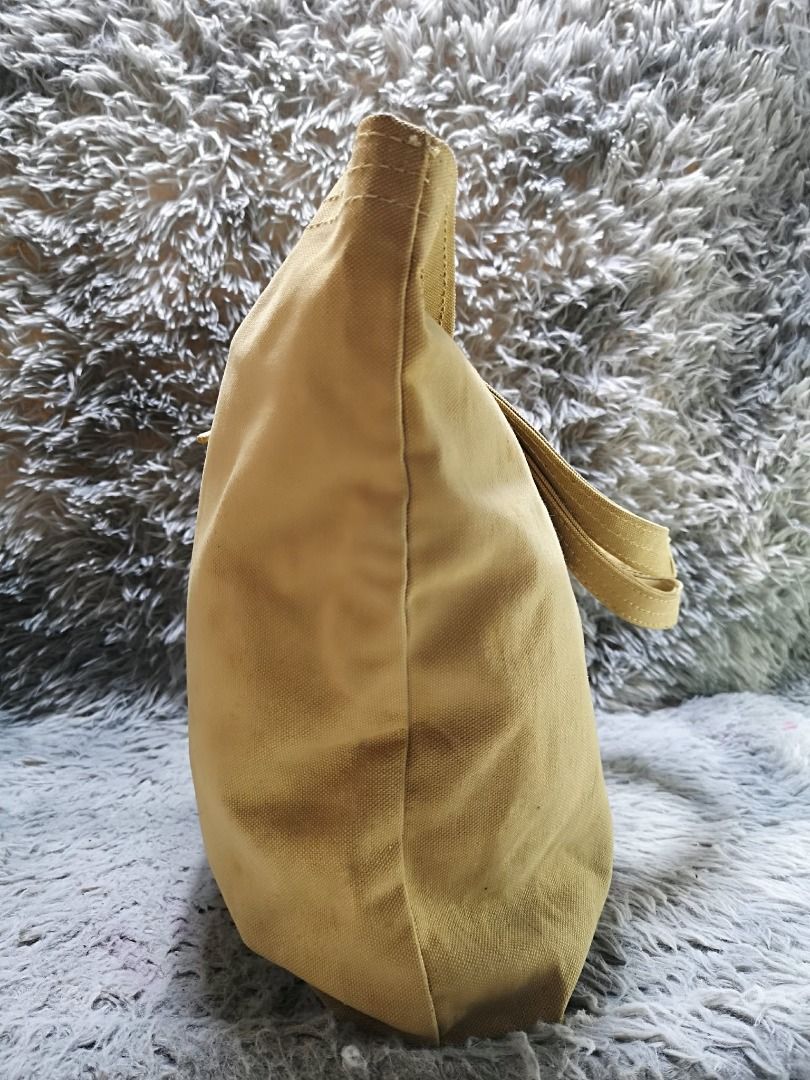 Snap Buttons Dark beige Shoulder Bag (Category: Shoulder Bags) located in Santa Cruz. Submitted by jmy_surplus.2 (Listing ID 1460593823, Image 2). Description: Size ; L - 16.4 W - 20.5 Color ; Beige Type ; Shoulder bag Brand ; No Brand Material ; Nylon Style ; Shoulder bag With Front pocket & Bow Design LR 167 JMY 1 Batch #219.