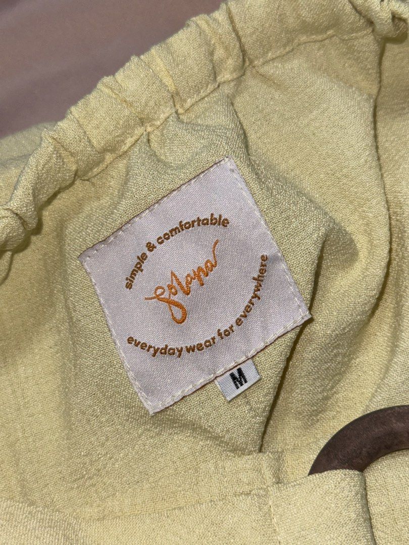 Solana Yellow Tube Top (M) (Category: Sleeveless) located in Makati City. Submitted by snoopysellsthings (Listing ID 1460613874, Image 3). Description: - Garterized tube top - Breathable fabric.
