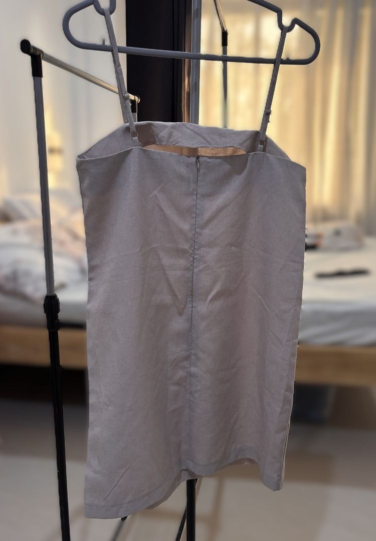 Spaghetti Strap Square Neck Dress (Category: Dresses) located in Mandaue City. Submitted by jbstl (Listing ID 1460602450, Image 3). Description: - Elegant grey dress - Features delicate spaghetti straps - Flattering square neckline - Fabric has a subtle sheen - Highly versatile: perfect for layering or wearing solo - Effortlessly dress up or down for any occasion - Size M (based on tag) - Personal preloved (bought online), please manage expectati