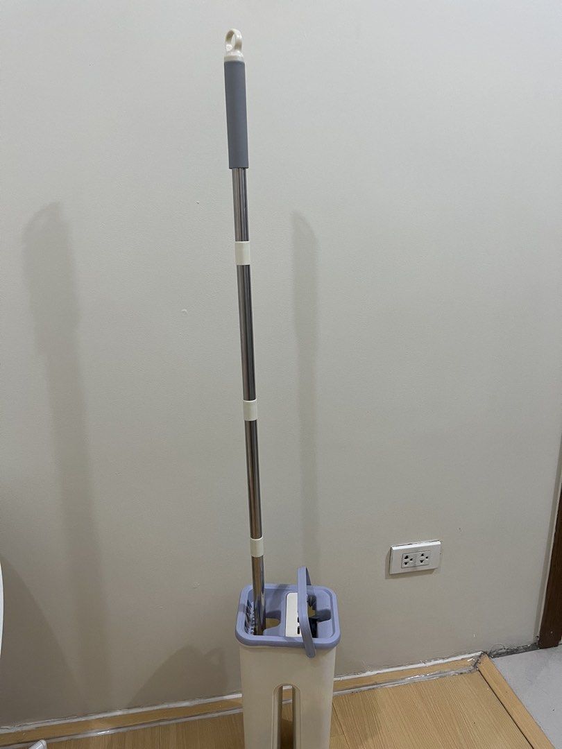Spin Mop and Bucket Set with Microfiber Mop Head (Category: Cleaning Tools & Supplies) located in Manila. Submitted by gentlefish_473ecf (Listing ID 1460546841, Image 1). Description: - Easy-to-use spin mop and bucket system - Includes one microfiber mop head - Bucket features separate compartments for washing and drying - Stainless steel handle extends for comfortable reach - Ideal for quick and efficient house cleanups - Mop head is washable an
