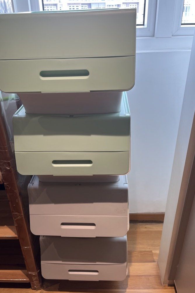 Stackable Storage box (Category: Storage Boxes & Baskets) located in Singapore. Submitted by disneytwins (Listing ID 1460552922, Image 2). Description: - stackable storage boxes , 1 for $4 only - Colors: 2 light green, 2 light grey - Features easy-open handles - Ideal for organizing clothes, toys, and household items - Can be stacked together or used individually.