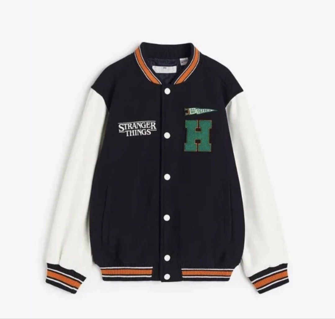 Stranger Things "H" Varsity Bomber Jacket (Category: Coats, Jackets and Outerwear) located in Manila. Submitted by jemmmandes (Listing ID 1460569078, Image 3). Description: - Cool Stranger Things varsity bomber jacket - Model Size: Small Body Frame.