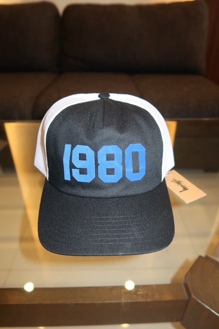 Stüssy 1980 Trucker Cap (Category: Caps & Hats) located in Zamboanga. Submitted by cobiray (Listing ID 1460602164, Image 1). Description: Stussy trucker cap. Black front with blue '1980' graphic, white mesh back. Adjustable snapback. New with tags. Perfect for everyday style. Stüssy 1980 Trucker Cap Authentic and brandnew from 🇺🇸 Color: Black Size: Adjustable Price: ₱4,300 Stocks: 2 pcs .