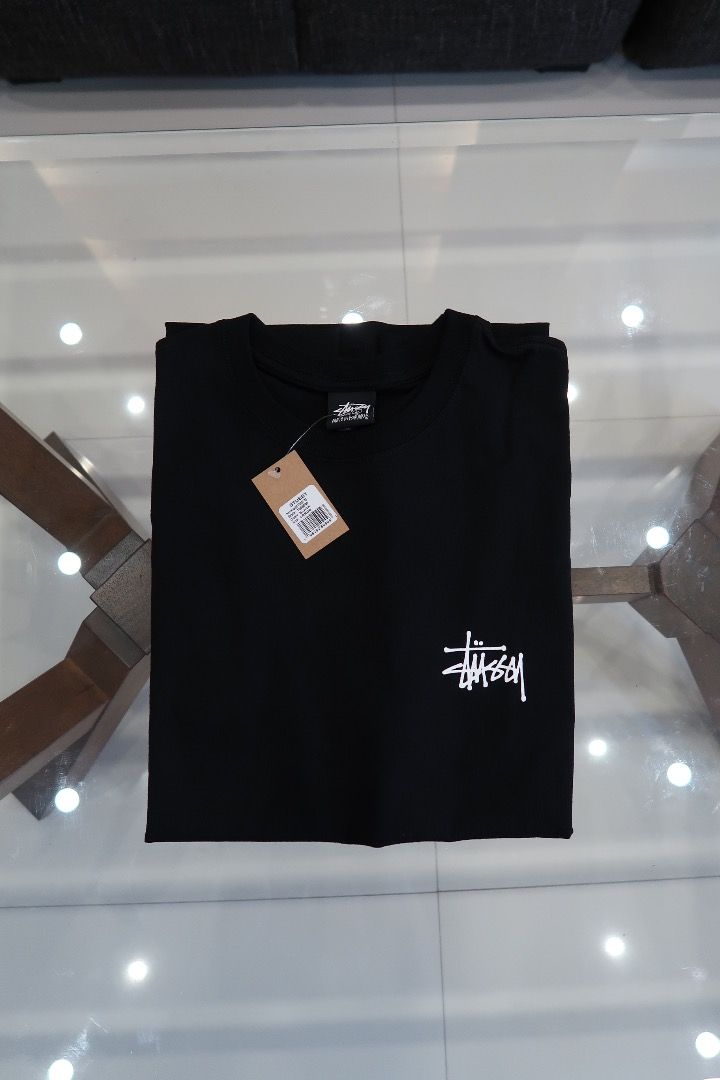 Stüssy Basic Tee (Category: Tshirts & Polo Shirts ) located in Caloocan City. Submitted by cobiray (Listing ID 1460595013, Image 1). Description: Classic black Stussy tee. Features the iconic white Stussy logo on the front and back. Great for casual wear. Comes with original tags attached. Color: Black Size: L — 23” × 29” Price: ₱5,000.