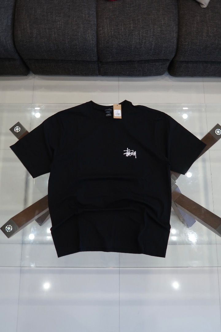 Stüssy Basic Tee (Category: Tshirts & Polo Shirts ) located in Caloocan City. Submitted by cobiray (Listing ID 1460595013, Image 3). Description: Classic black Stussy tee. Features the iconic white Stussy logo on the front and back. Great for casual wear. Comes with original tags attached. Color: Black Size: L — 23” × 29” Price: ₱5,000.