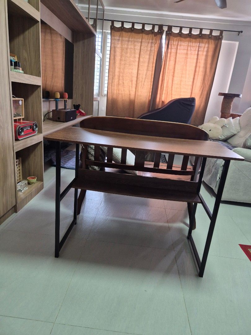Study Table (Category: Tables & Sets) located in Singapore. Submitted by by.iman (Listing ID 1460546753, Image 2). Description: Study table to bless. Still in good condition. About 1m in length. Standard height. Need to tighten the screws so it will balance. Slightly rocky now. Will not dismantle. 70cm by 45cm by 100cm You need own manpower and own trsnsport..