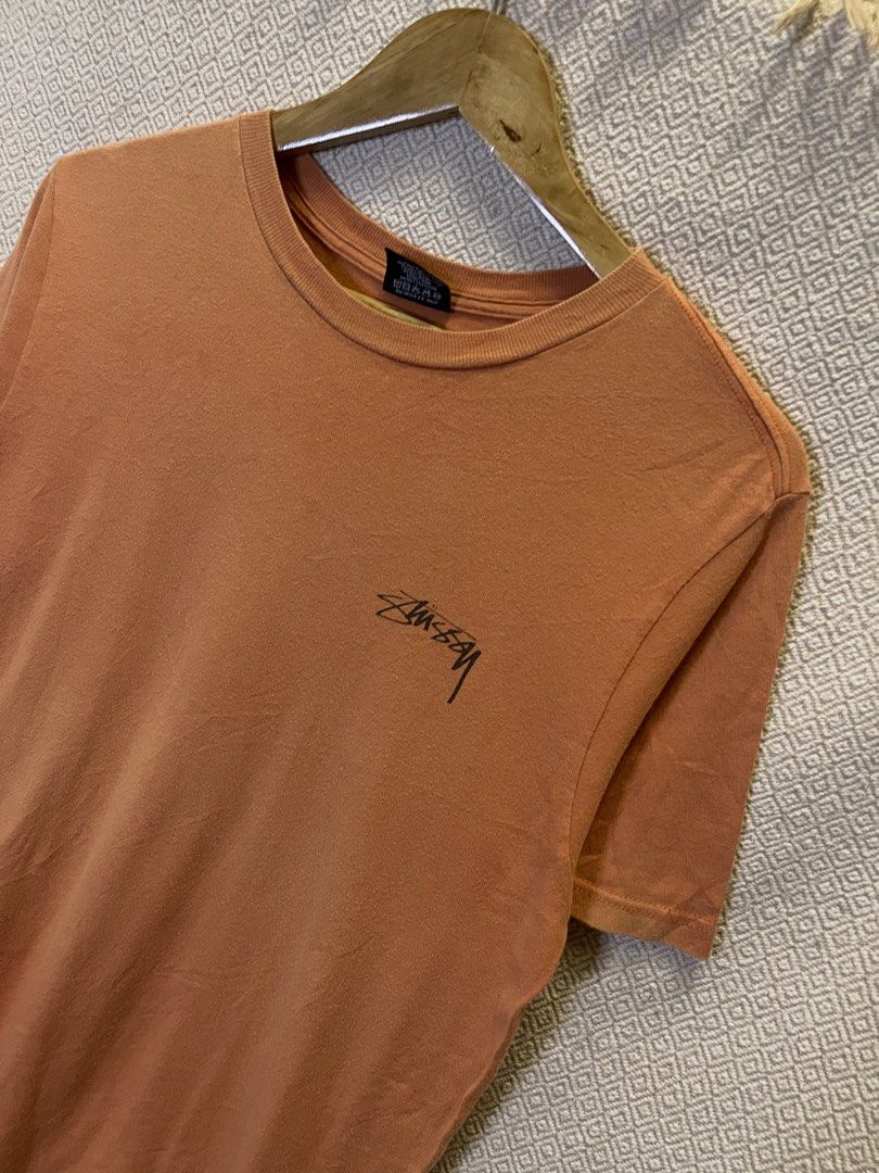 Stussy peach tee (Category: Tshirts & Polo Shirts ) located in Manila. Submitted by hypestock_mnl (Listing ID 1460530611, Image 2). Description: - stylish - perfect for casual wear - great fit - in good condition - minimal signs of usage - 9/10 - money worth! - see pics for details/issue.