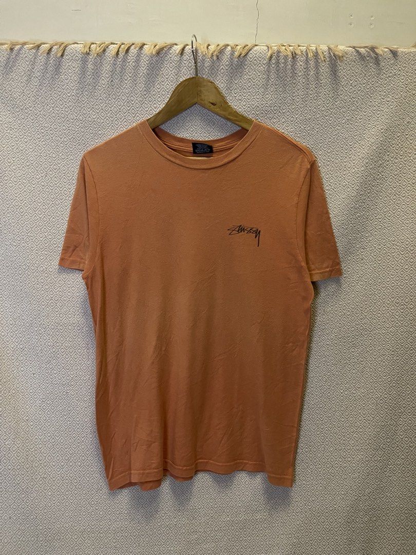 Stussy peach tee (Category: Tshirts & Polo Shirts ) located in Manila. Submitted by hypestock_mnl (Listing ID 1460530611, Image 1). Description: - stylish - perfect for casual wear - great fit - in good condition - minimal signs of usage - 9/10 - money worth! - see pics for details/issue.