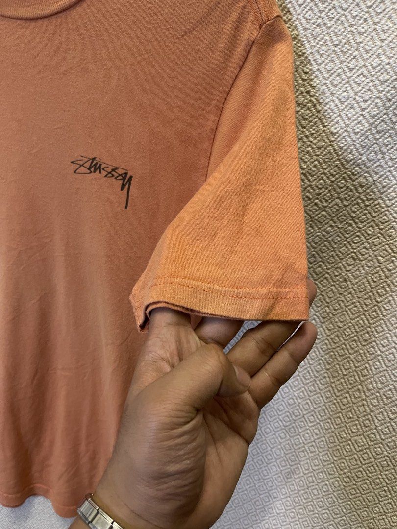 Stussy peach tee (Category: Tshirts & Polo Shirts ) located in Manila. Submitted by hypestock_mnl (Listing ID 1460530611, Image 3). Description: - stylish - perfect for casual wear - great fit - in good condition - minimal signs of usage - 9/10 - money worth! - see pics for details/issue.