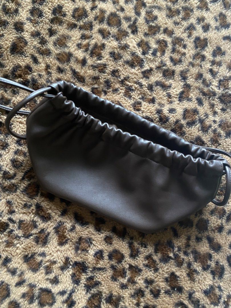 Sunnies Dumpling Bag (Category: Purses & Pouches) located in Paranaque City. Submitted by fancyshit (Listing ID 1460510277, Image 2). Description: - Barely used - can buy both at 750, if separate 450 each - Good Condition MOP: BDO/Security Bank/Maya MOD: GGX/Lalamove.