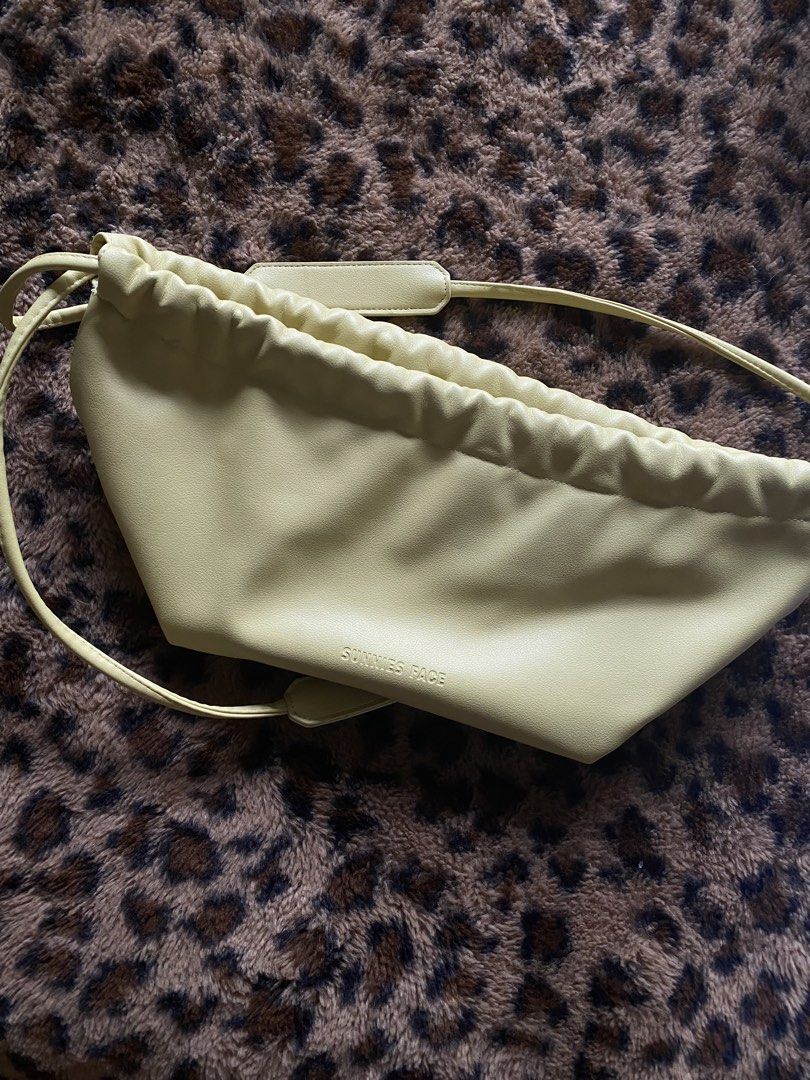 Sunnies Dumpling Bag (Category: Purses & Pouches) located in Paranaque City. Submitted by fancyshit (Listing ID 1460510277, Image 3). Description: - Barely used - can buy both at 750, if separate 450 each - Good Condition MOP: BDO/Security Bank/Maya MOD: GGX/Lalamove.
