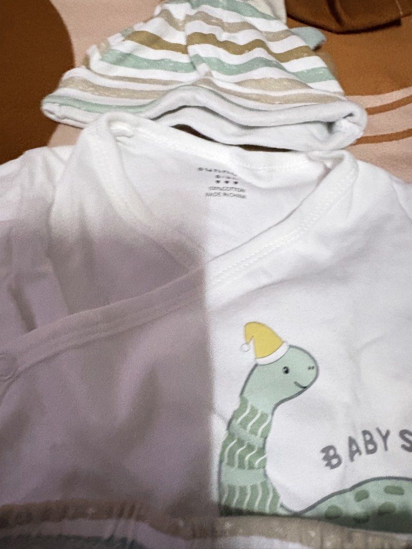 Sunnozy Newborn set (Category: Babies & Kids Fashion) located in Quezon City. Submitted by alexiszowie (Listing ID 1460576780, Image 3). Description: sunnozy newborn set never been used nawash lang siya bought for 449.