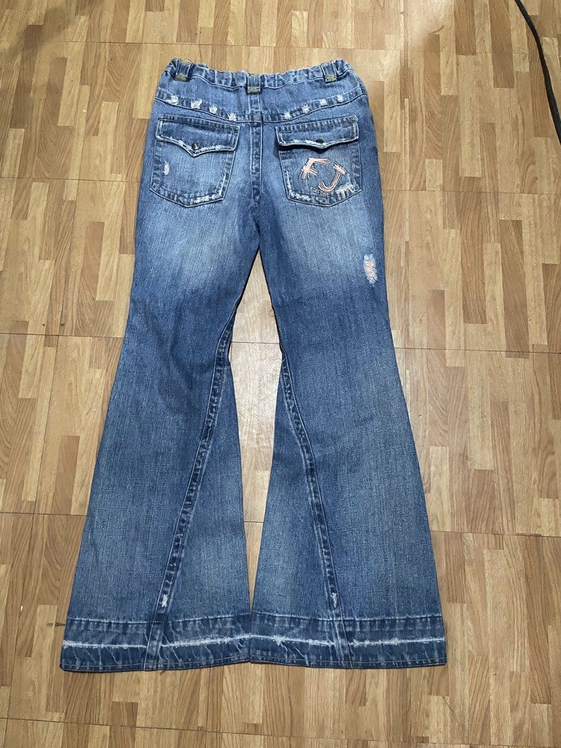SUPER STAR (Category: Jeans) located in General Santos City (Dadiangas). Submitted by yusofubpon (Listing ID 1460686057, Image 2). Description: WAIST-29to34(stretchable back) LENGTH-42.5 LEGOPENING-11.5 Vintage Flare Jeans Washed blue denim with bold distressed patches, faded detailing, flap back pockets, and a wide bootcut/flare leg..