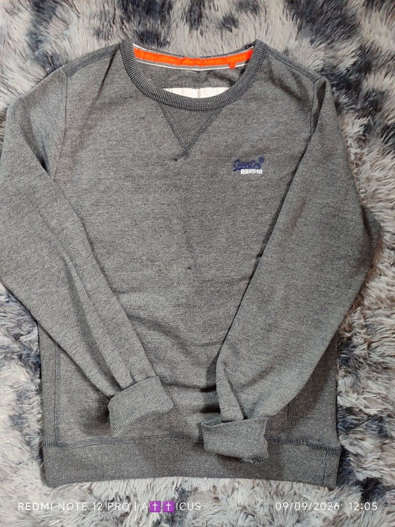 Superdry Sweatshirt (Category: Coats, Jackets and Outerwear) located in Mangaldan. Submitted by lostthread (Listing ID 1460565540, Image 1). Description: Superdry Sweatshirt Color Rate: Excellent Issue: Check pix , nag-iisang mothhole sa gitna pero di naman halata. Sa interesado pm na lng sa dimes.