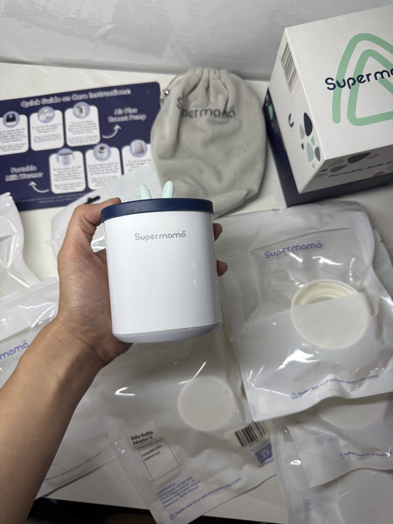 Supermamalab Portable Milk Warmer 2.0 (Category: Breastfeeding & Bottle Feeding) located in Tarlac. Submitted by kmfspreloved (Listing ID 1460617041, Image 1). Description: - Supermama Portable Milk Warmer 2.0 - Input Voltage: 9V 2A/3A - Battery Capacity: 4400mAh x2 - Lot Number: BML24B - Includes: Pouch, Quick Guide, Multiple Baby Bottle Adapters and original box .
