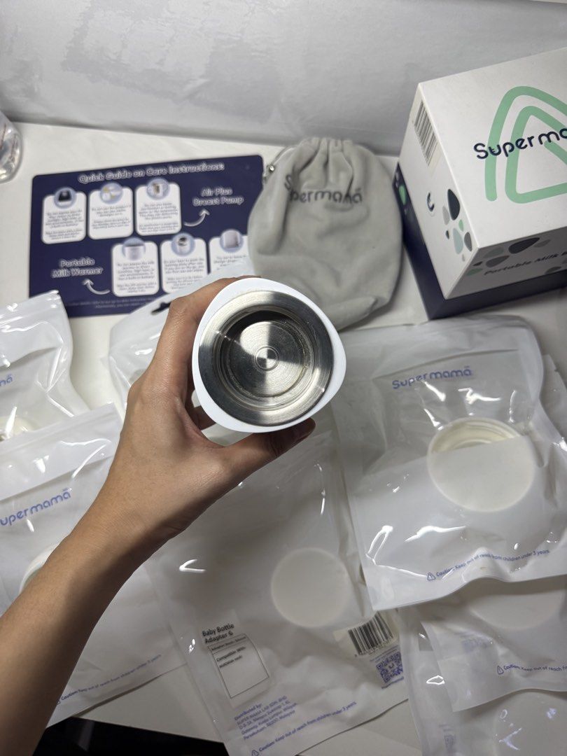 Supermamalab Portable Milk Warmer 2.0 (Category: Breastfeeding & Bottle Feeding) located in Tarlac. Submitted by kmfspreloved (Listing ID 1460617041, Image 2). Description: - Supermama Portable Milk Warmer 2.0 - Input Voltage: 9V 2A/3A - Battery Capacity: 4400mAh x2 - Lot Number: BML24B - Includes: Pouch, Quick Guide, Multiple Baby Bottle Adapters and original box .