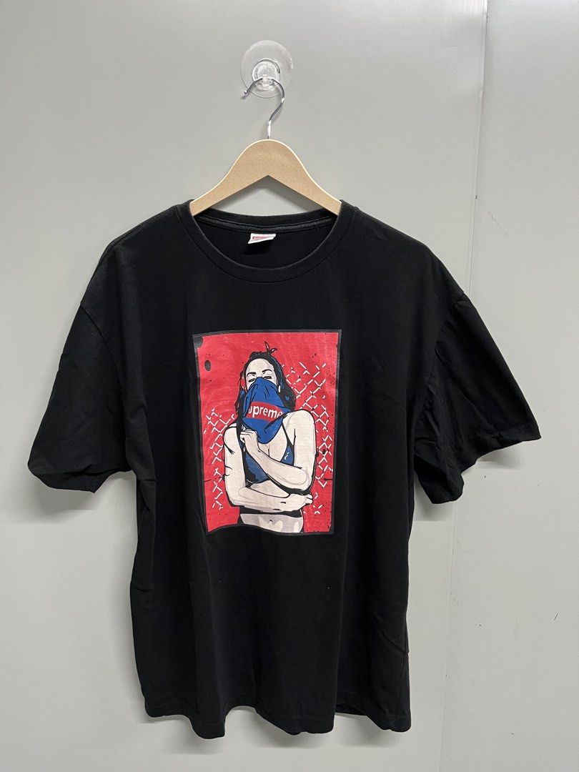 Supreme Graphic Tee (Category: Tshirts & Polo Shirts ) located in Valencia. Submitted by shopstnd (Listing ID 1460592652, Image 1). Description: Supreme Graphic Tee 📏 22 × 29 in ⭐ Condition: 9/10 🎨 Color: 9/10 100% Cotton • Made in USA Clean graphic, solid black color, and great overall condition..