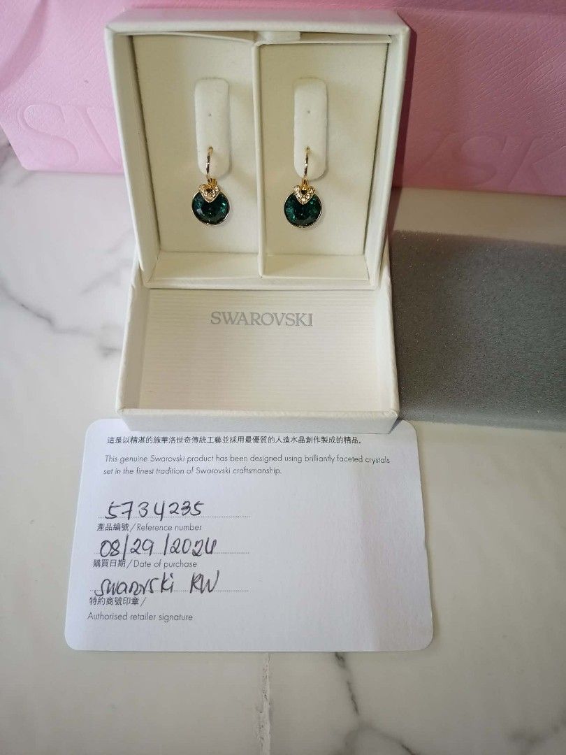 Swarovski Bella Earrings (Category: Luxury Accessories) located in Mandaluyong City. Submitted by noel_30 (Listing ID 1460585565, Image 3). Description: Free cleaning at any swarovski branch just bring Aunthentication card With Authentication card Non-Tarnish W/ Box, Pink Paper Bag and Ribbon Article no.: 5735389 Collection: Bella Size: 1.9 x 1 cm Material: Crystals, 18K gold finish Color: Green Weight (individual piece): 1.7 g.