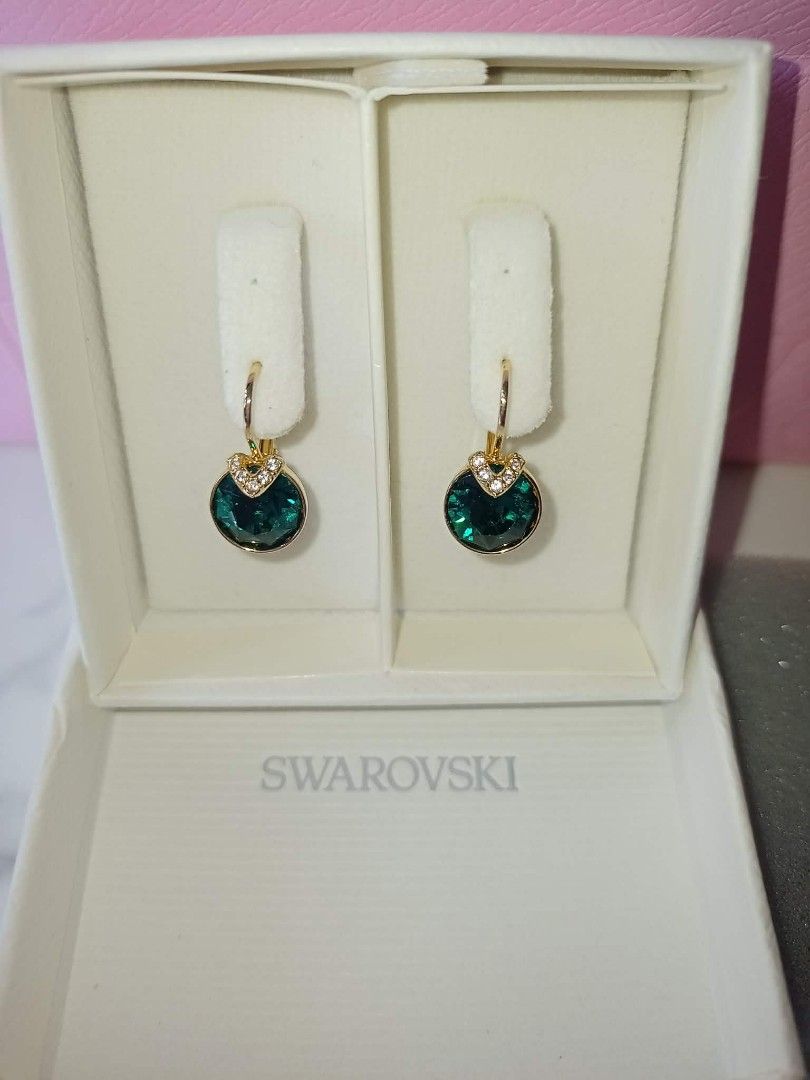 Swarovski Bella Earrings (Category: Luxury Accessories) located in Mandaluyong City. Submitted by noel_30 (Listing ID 1460585565, Image 2). Description: Free cleaning at any swarovski branch just bring Aunthentication card With Authentication card Non-Tarnish W/ Box, Pink Paper Bag and Ribbon Article no.: 5735389 Collection: Bella Size: 1.9 x 1 cm Material: Crystals, 18K gold finish Color: Green Weight (individual piece): 1.7 g.