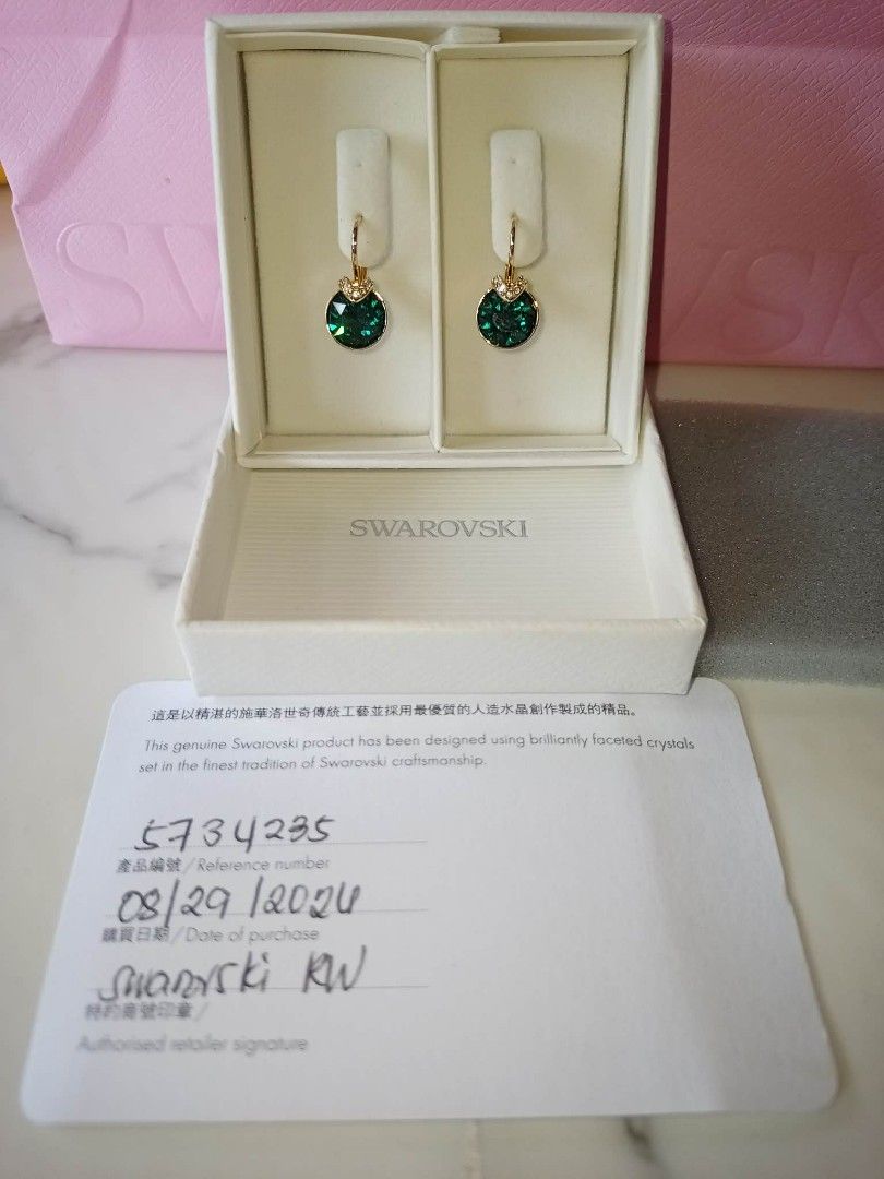 Swarovski Bella Earrings (Category: Luxury Accessories) located in Mandaluyong City. Submitted by noel_30 (Listing ID 1460585565, Image 1). Description: Free cleaning at any swarovski branch just bring Aunthentication card With Authentication card Non-Tarnish W/ Box, Pink Paper Bag and Ribbon Article no.: 5735389 Collection: Bella Size: 1.9 x 1 cm Material: Crystals, 18K gold finish Color: Green Weight (individual piece): 1.7 g.