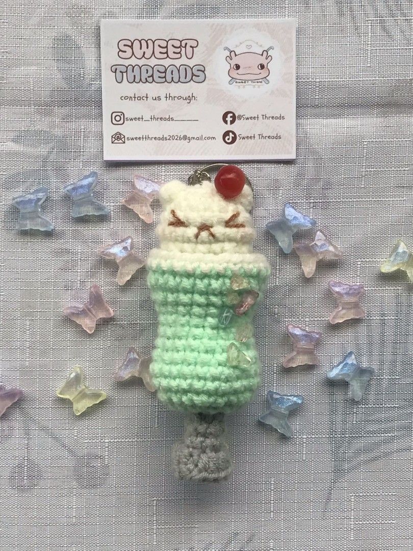 Sweet Threads Crochet Cat Keychain with Cherry (Category: Handmade Craft) located in Rizal. Submitted by gentlebear-6e31 (Listing ID 1460712460, Image 1). Description: meet up pwede sa Rizal montalban manila hills or caloocan MCU - Adorable handmade crochet bear parfait eychain - Dessert-inspired design with a cherry on top - Mint green body with sparkly bead accents - Includes a sturdy keyring - Ideal for personalizing bags, backpacks, or keys -